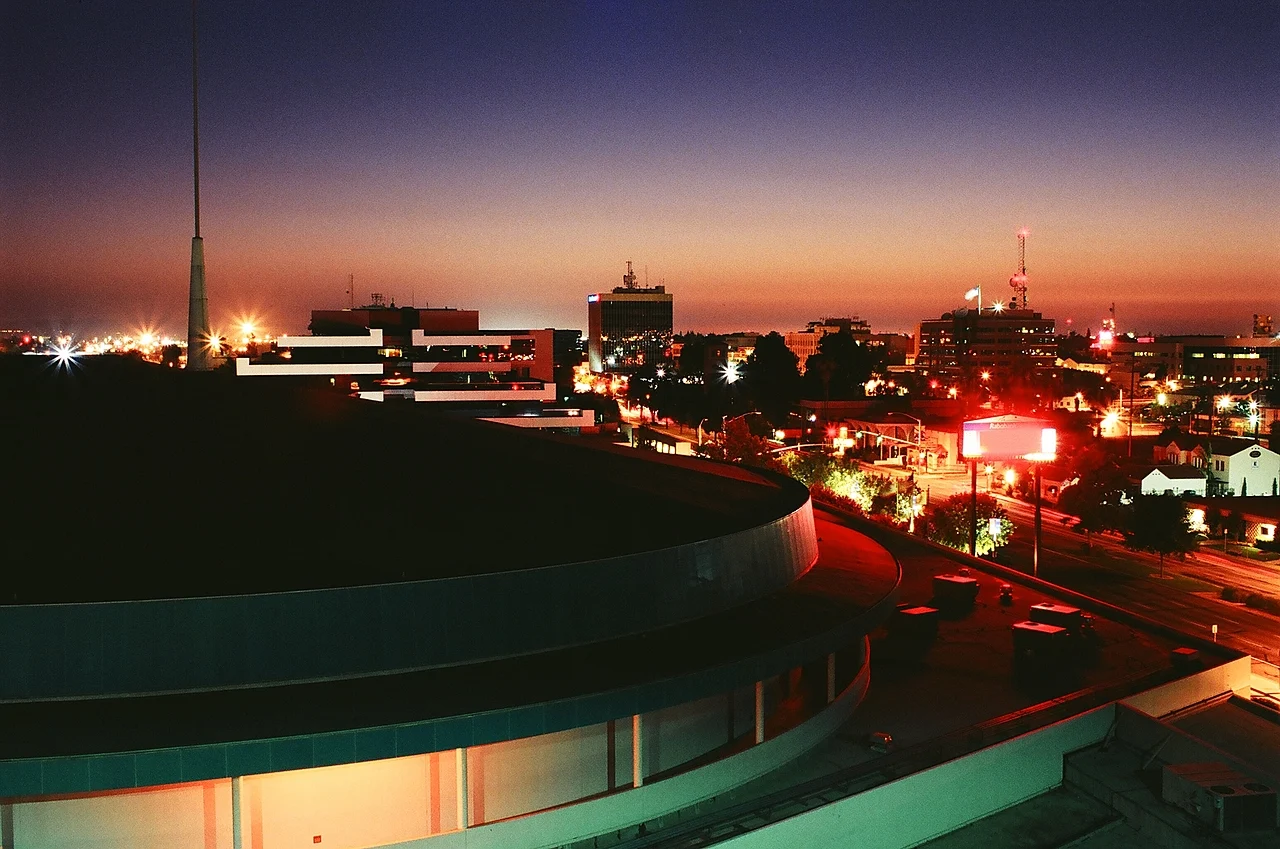Bakersfield skyline at dusk with downtown buildings and city lights
